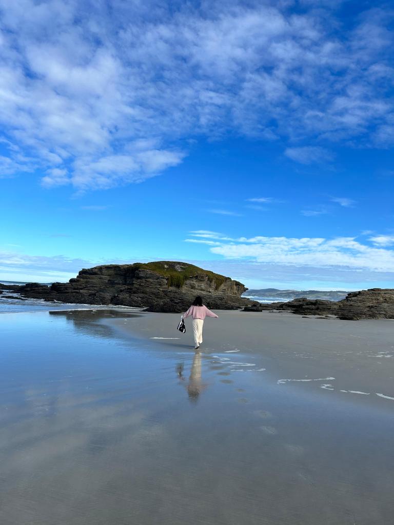 Me embracing the breeze at Brighton Beach, Dunedin.