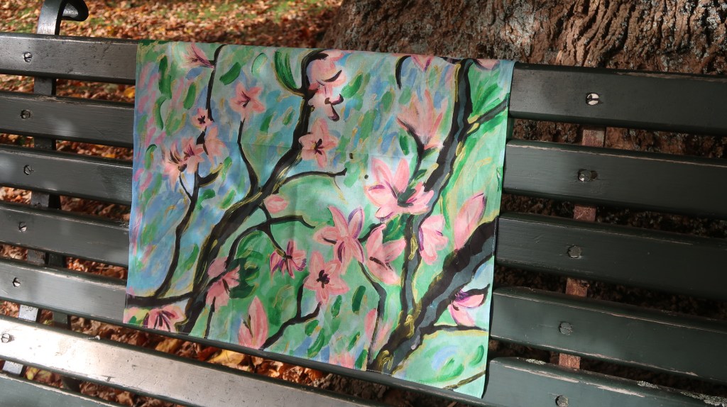 Magic Scarf (3x available, $35 each, 100% Cotton, 55cmx55cm)
The Magic Scarf evokes sakura in spring, inspired by impressionist Erin Hanson, with gold and green hues reflecting the unique colours of Otago. 